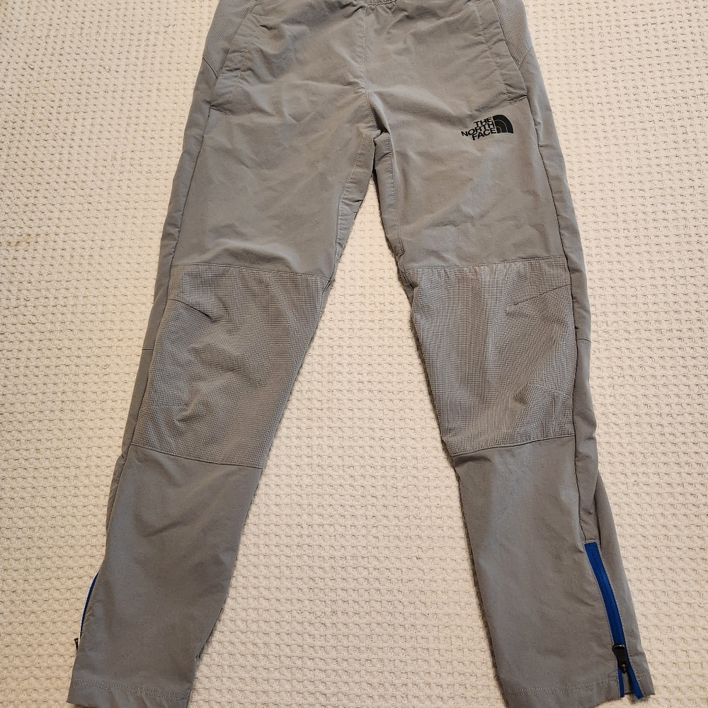The North Face boys grey performance pants. Size large.